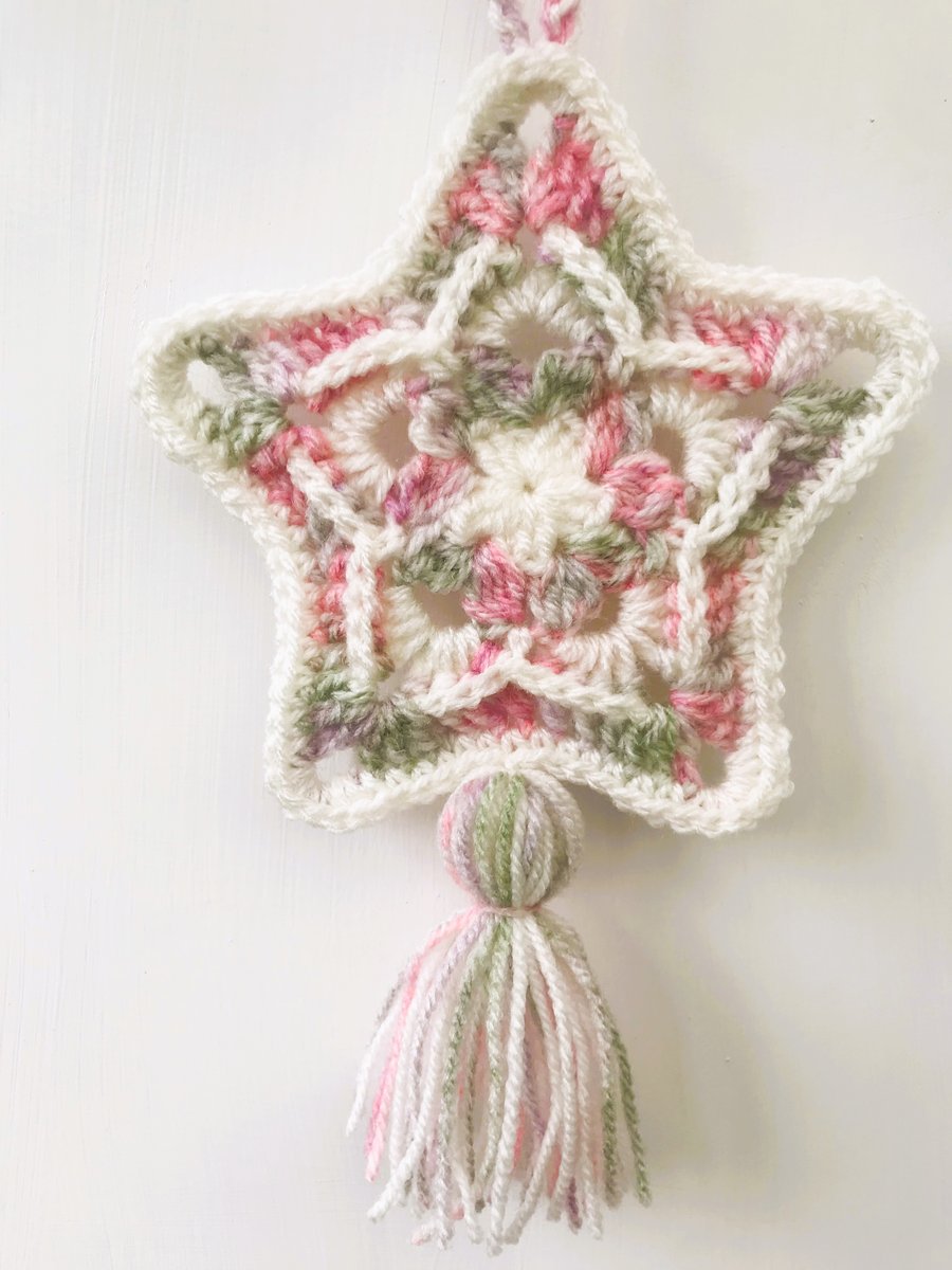 Cream, pink and green star crochet hanging decoration with tassel