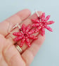 Funky Daisy Earrings in Bright Cherry Red with a Flower Pattern - Image 2