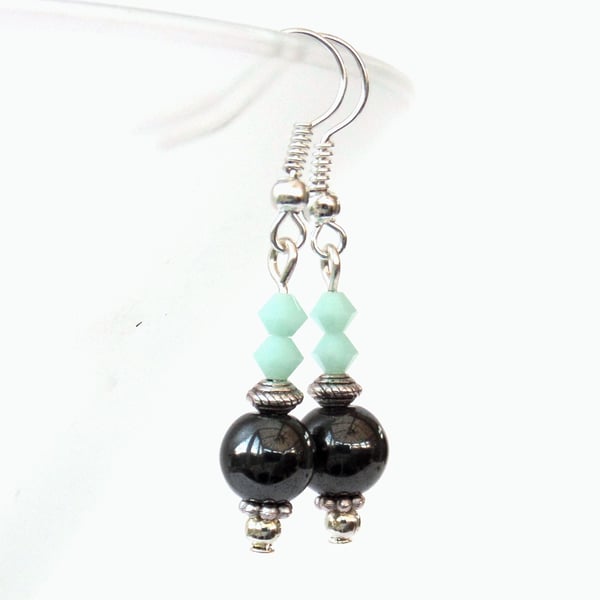 Hematite earrings with mint alabaster crystals by Swarovski®