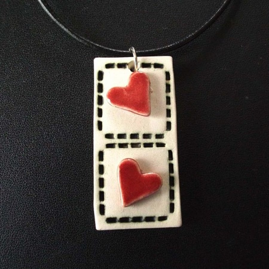 Two hearts ceramic pendant