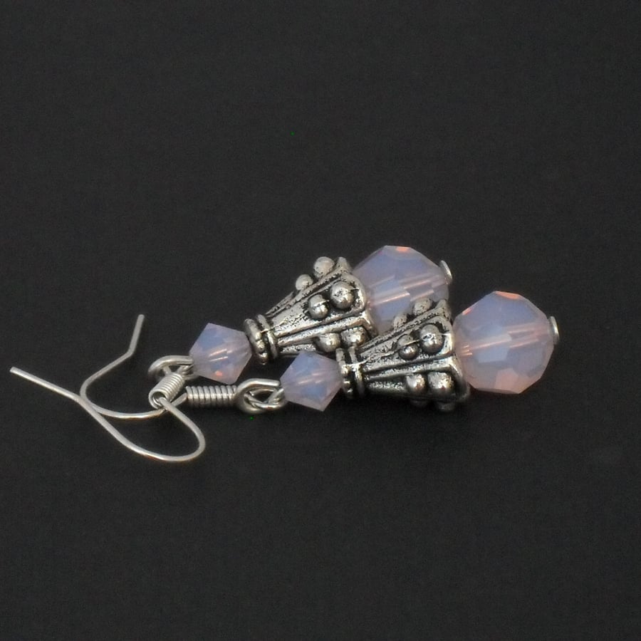 Pink earrings, made with  opaque crystals 