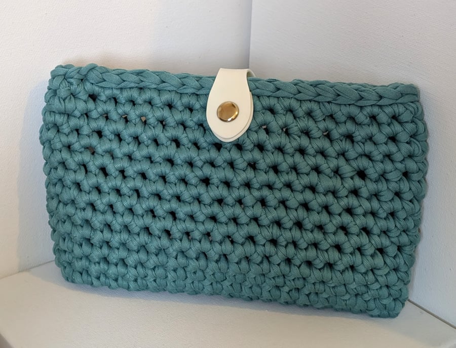 Handmade turquoise colour crochet clutch bag made with t-shirt yarn 