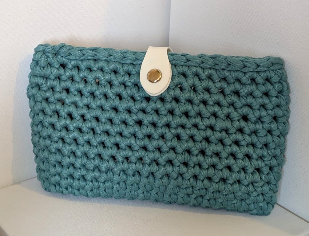 Handmade turquoise colour crochet clutch bag made with t-shirt yarn 