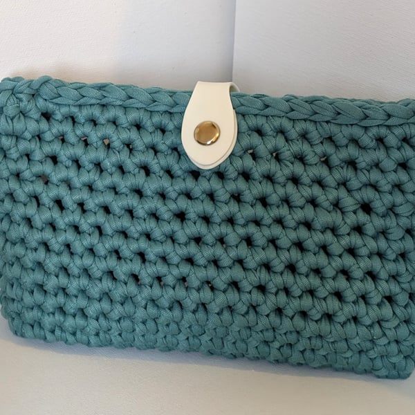 Handmade turquoise colour crochet clutch bag made with t-shirt yarn 