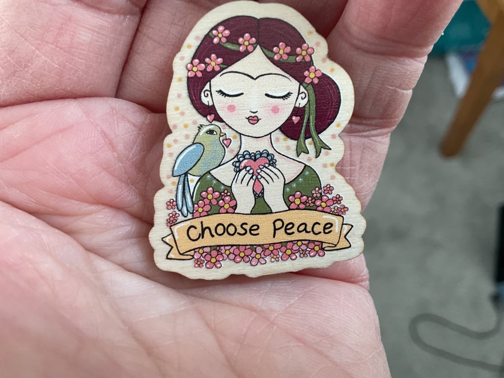 Choose Peace wooden pin badge, whimsical girl with bird illustration 