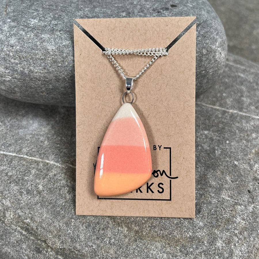 Large pebble shaped pendant in coral and peach