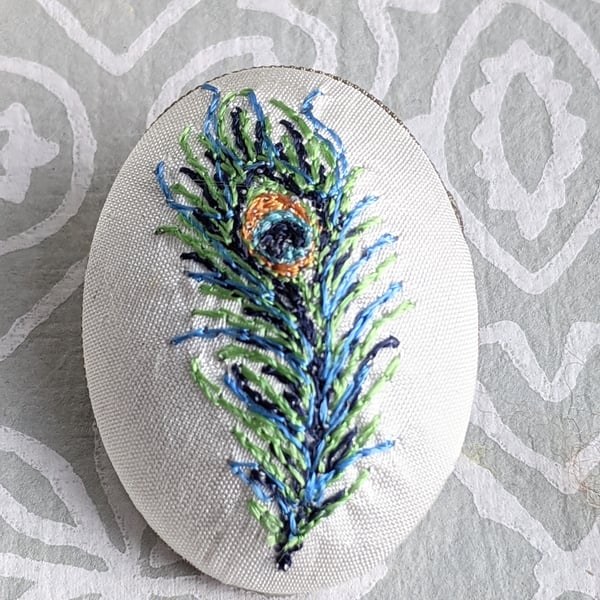 Peacock feather embroidered brooch