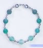 Beaded bracelet with crackle glass and sterling silver green blue stretchy - Image 4