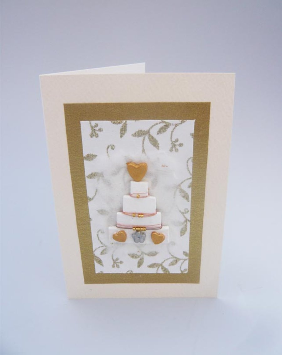 Wedding card with wedding cake.