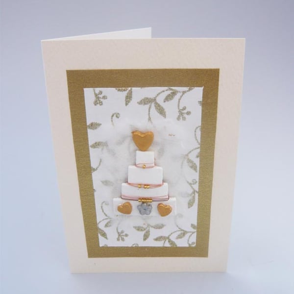 Wedding card with wedding cake.