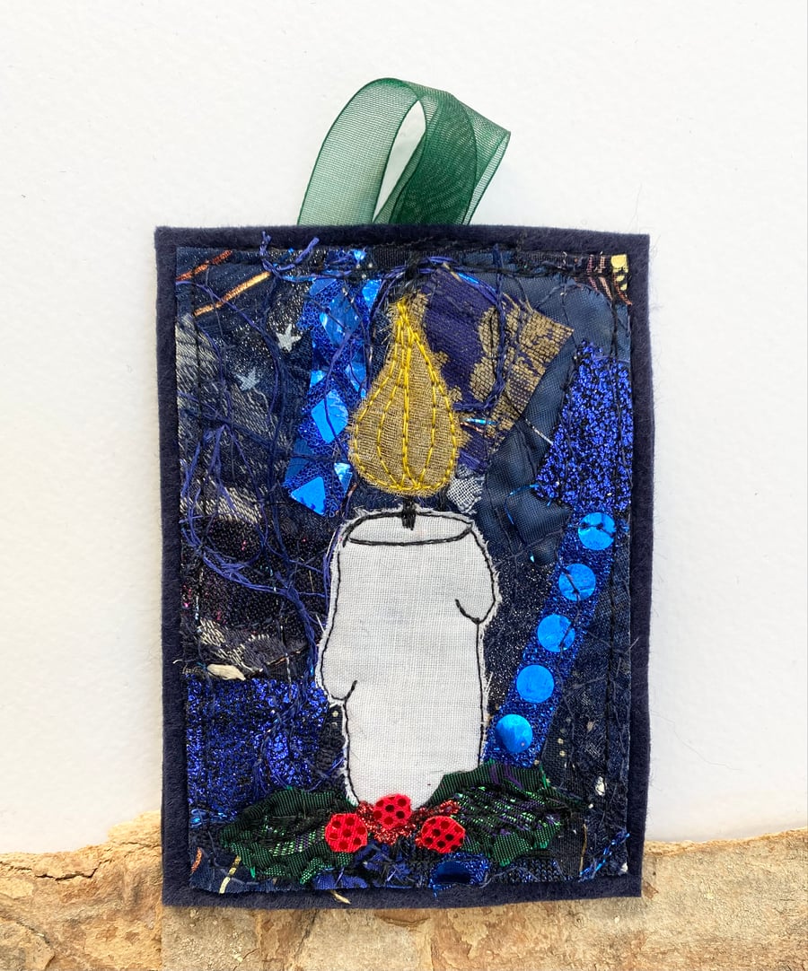 Upcycled embroidered candle with holly home Christmas decoration. 