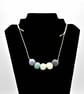 Felted bead necklace in grey, green and cream wool - Image 1