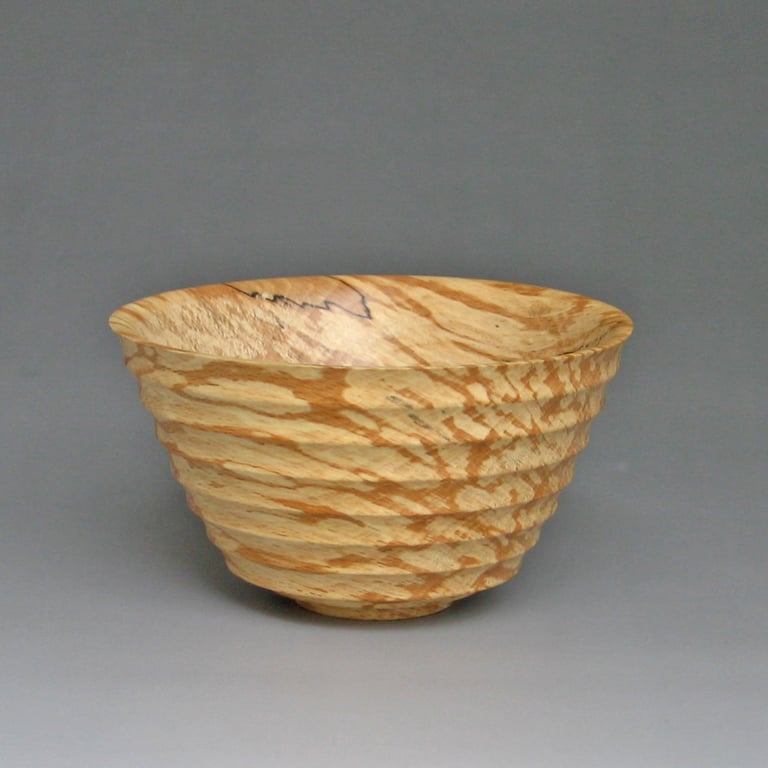 A scalloped dish in spalted ash