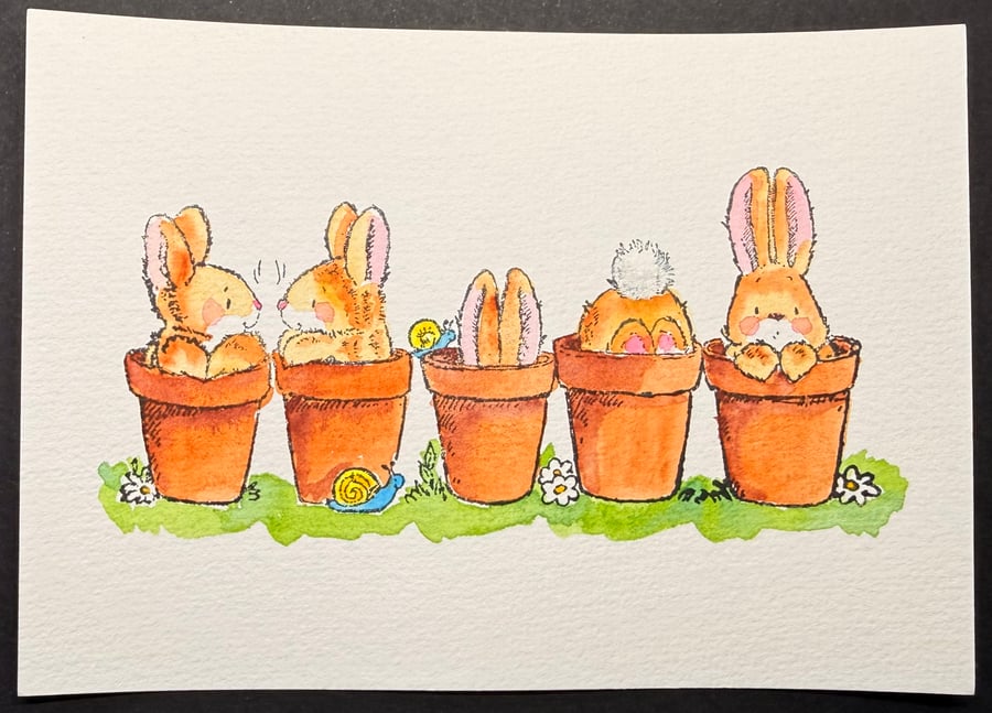 Hand watercoloured card topper from Penny Black stamp - bunnies in flowerpots