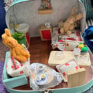Rabbit Bedsit doll's house in a suitcase 