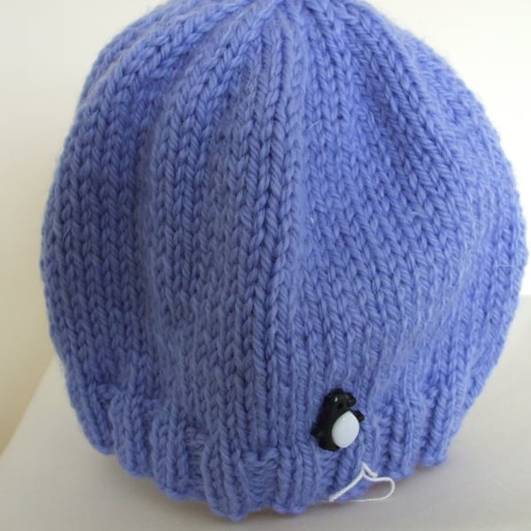 Knitted baby hat in blue