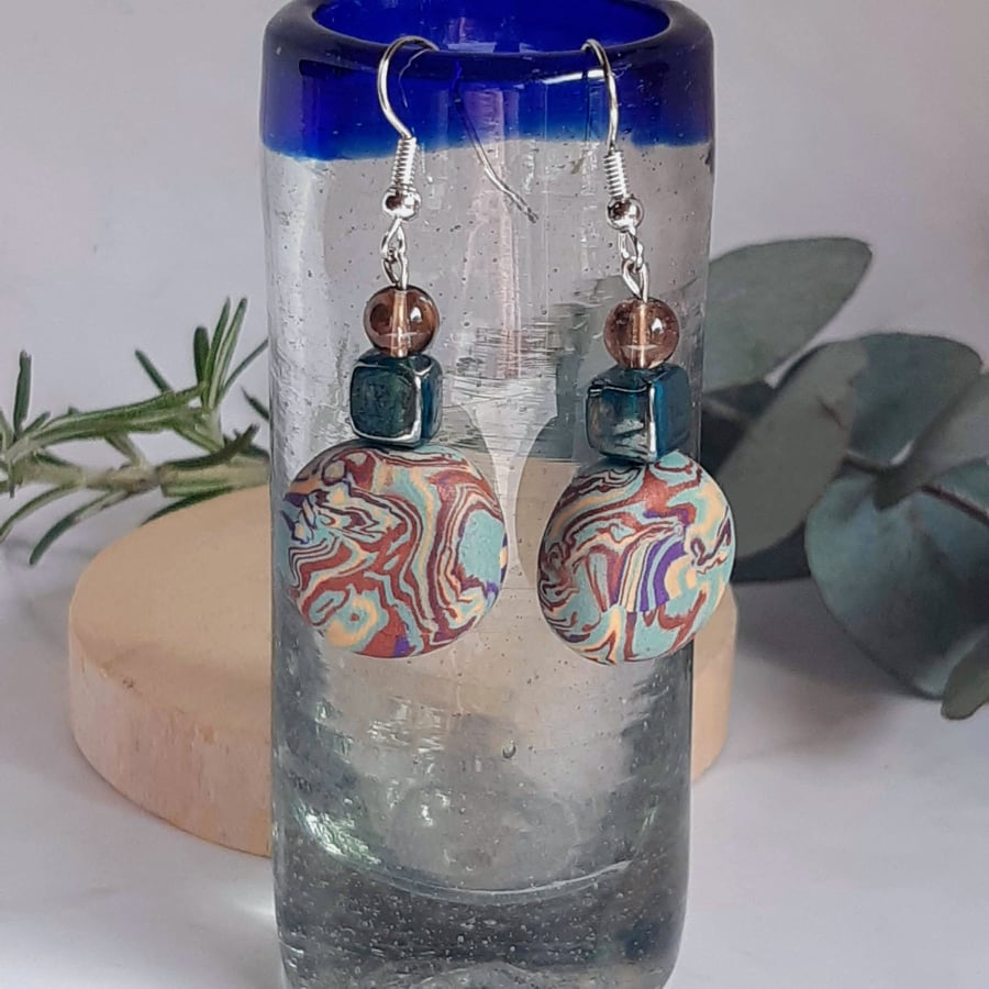 Turquoise, purple and sienna dangly disc polymer clay earrings 