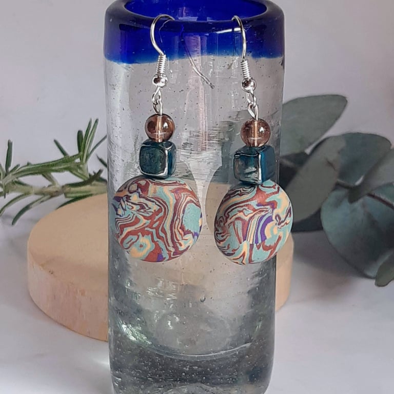 Turquoise, purple and sienna dangly disc polymer clay earrings 