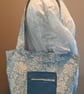 Blue tote bag with pockets and magnetic popper fastening.   - Image 7