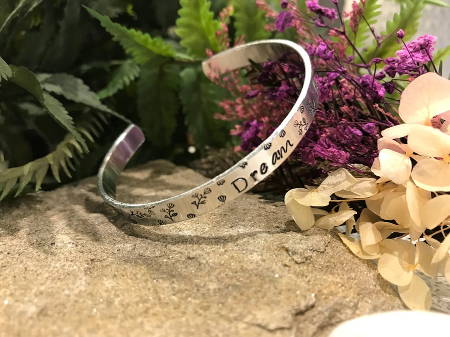 Aluminium Hand Stamped 'Dream'  Skinny Cuff Bangle with Floral Detail