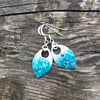 Turquoise, white and a touch of black enamel scale earrings. Sterling silver. 