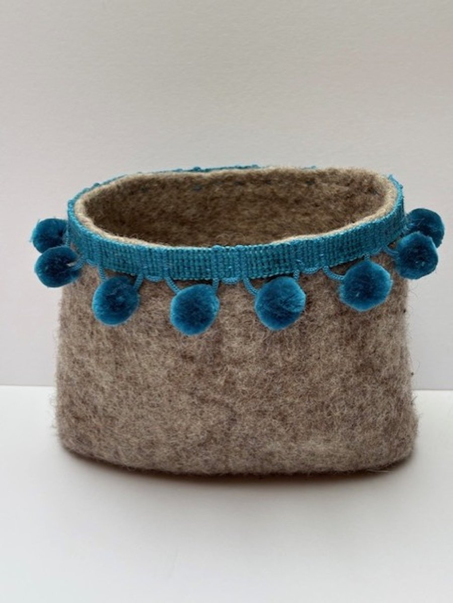 Funky felted plant pot holder.