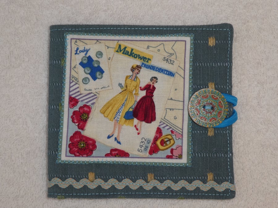 Sewing Needle Case with Sewing Pattern Applique Panel. Blue. Blue lining.