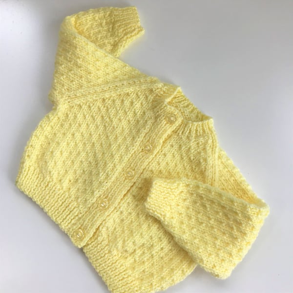 Hand knitted baby cardigan to fit up to 12 months in lemon