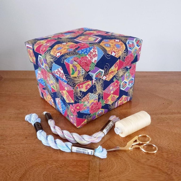 Sewing box with removable lid, pincushion and elasticated pocket