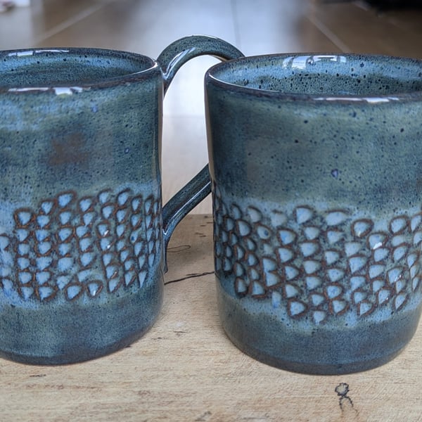Carved mugs