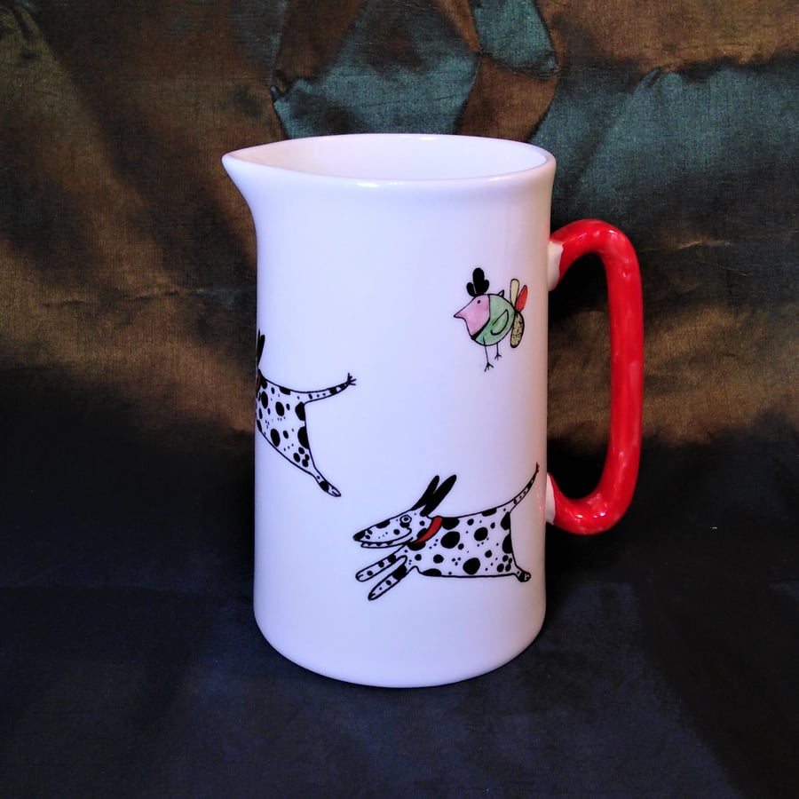 One pint china jug hand painted with running spotty Dalmatians
