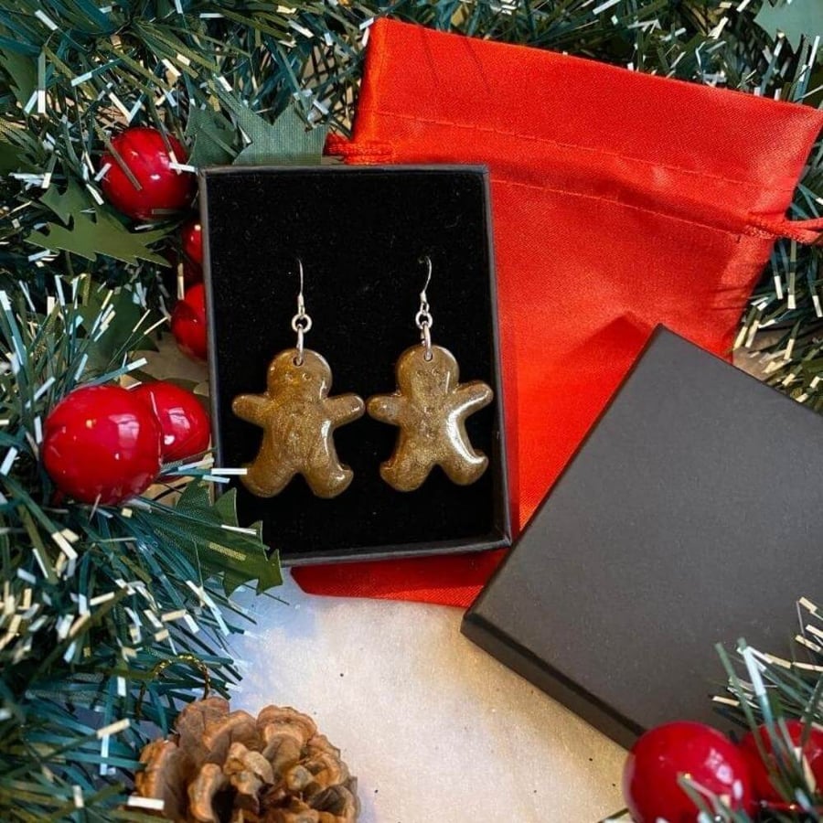 Resin gingerbread festive earrings on sterling silver ear wires.