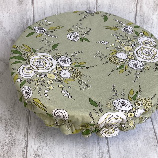 One large reusable bowl cover to fit a mixing bowl. Sage green floral