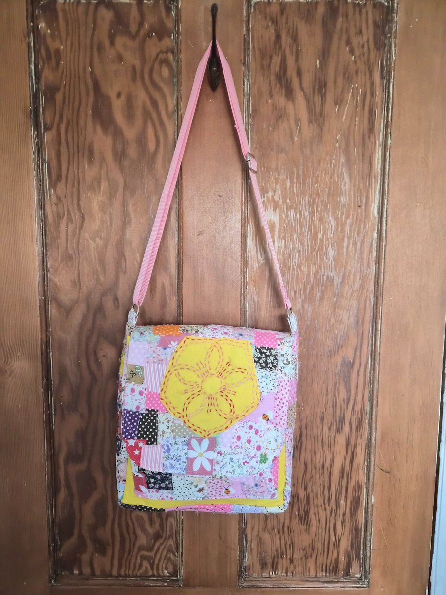 Image of Quilted patchwork cross body bag with adjustable strap.