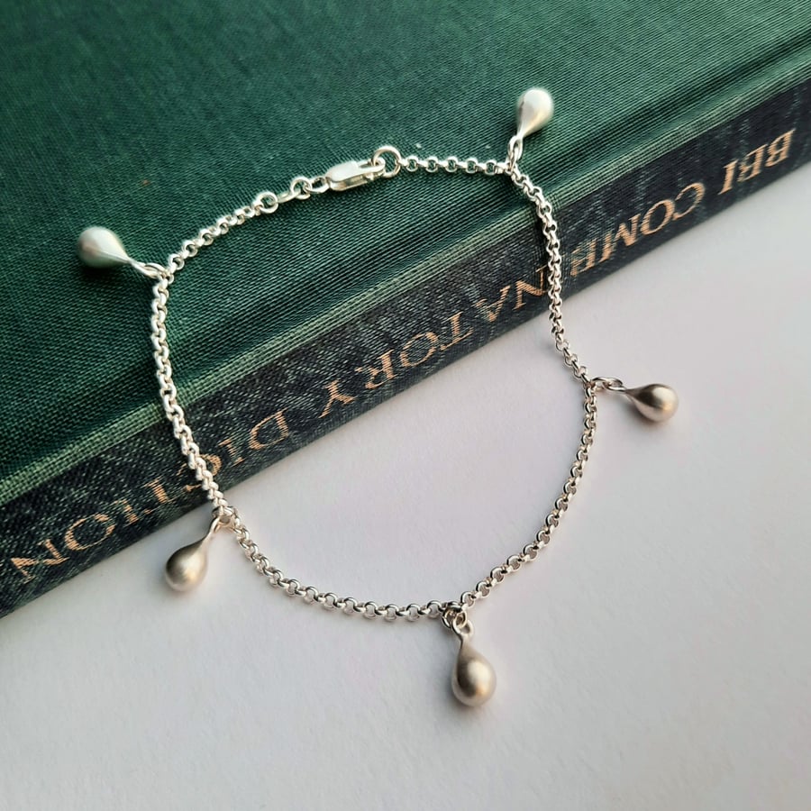 Silky Silver Teardrop Charm Bracelet