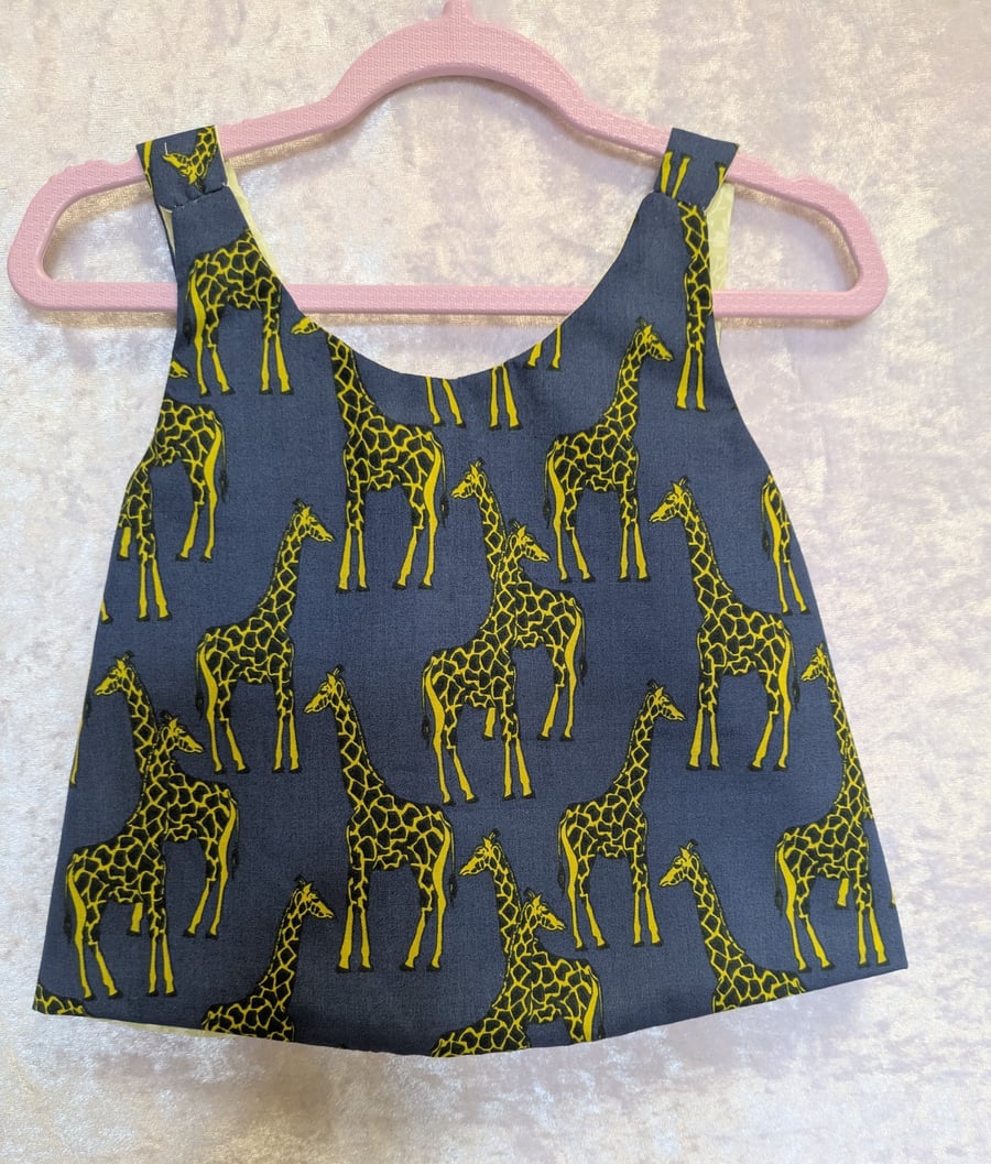 Reversible baby top. Blue with giraffes. 6 to 9 months old.