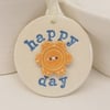 Ceramic decoration Happy Day with flower button