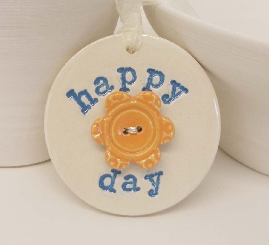 Ceramic decoration Happy Day with flower button