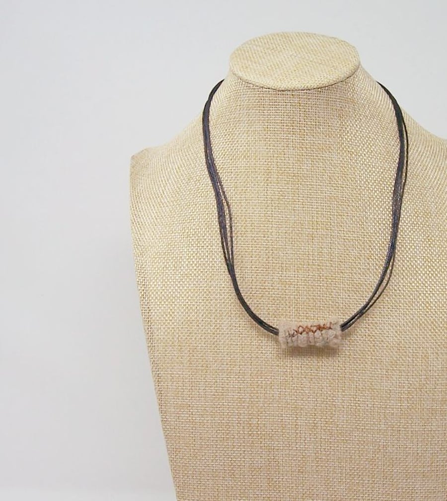 Fabric bead necklace with waxed cotton cord in natural colours