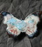 Butterfly brooch, enamelled white, wing tips black, wings patterned blue and red - Image 6