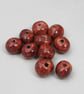 10 Small Bright Copper Glazed Clay Beads - Image 1