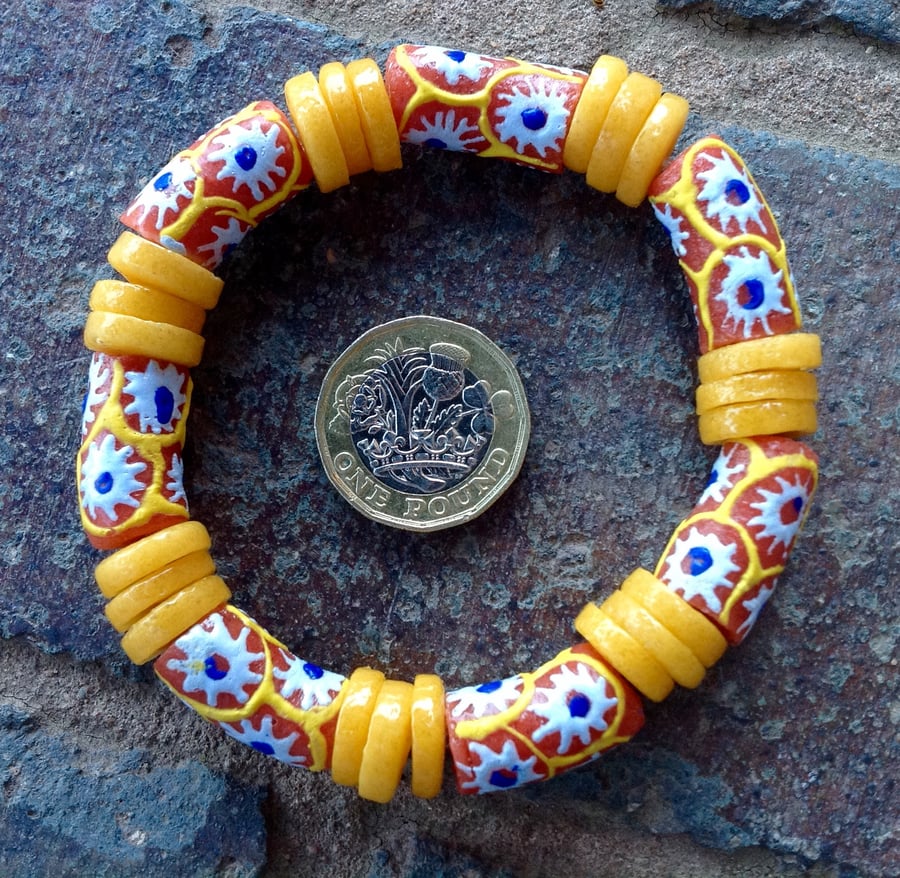 7" African bead bracelet with golden yellow disks