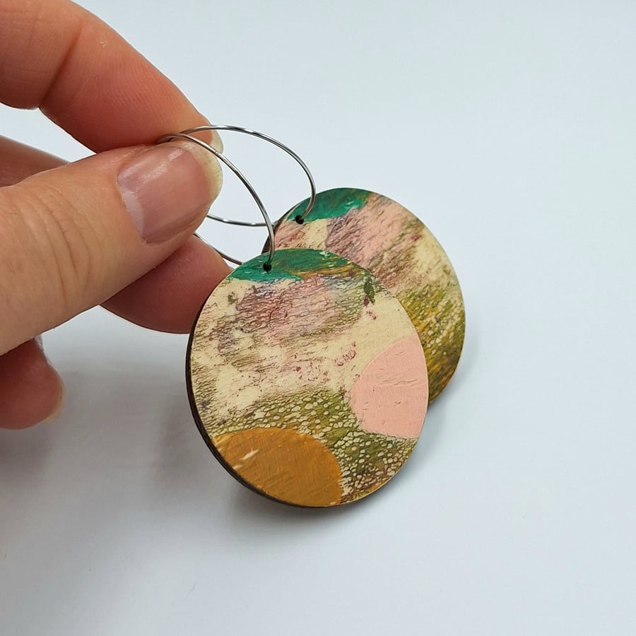 Hooped hand printed wooden dangly earrings in subtle muted colours