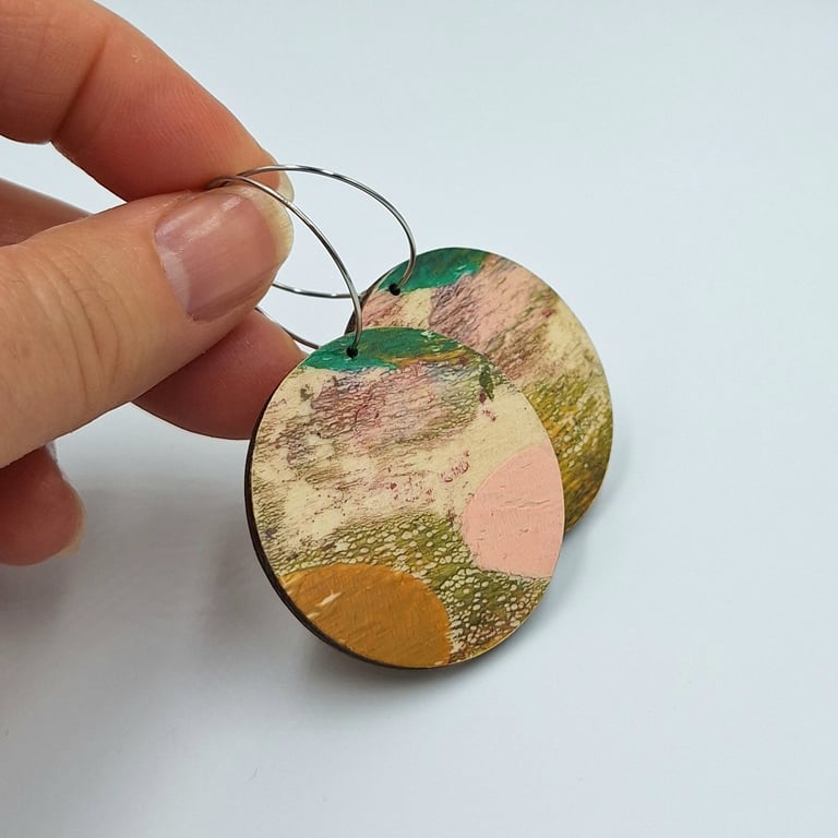 Hooped hand printed wooden dangly earrings in subtle muted colours