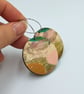 Hooped hand printed wooden dangly earrings in subtle muted colours - Image 1