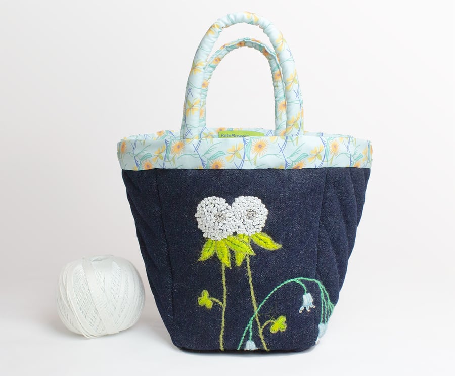 Black denim project bag with hand embroidered clover and bluebell