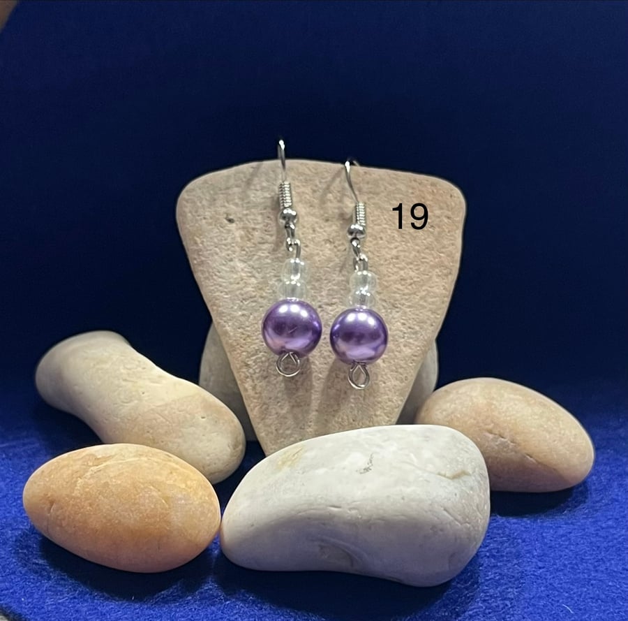 Beautiful purple dangling earrings.