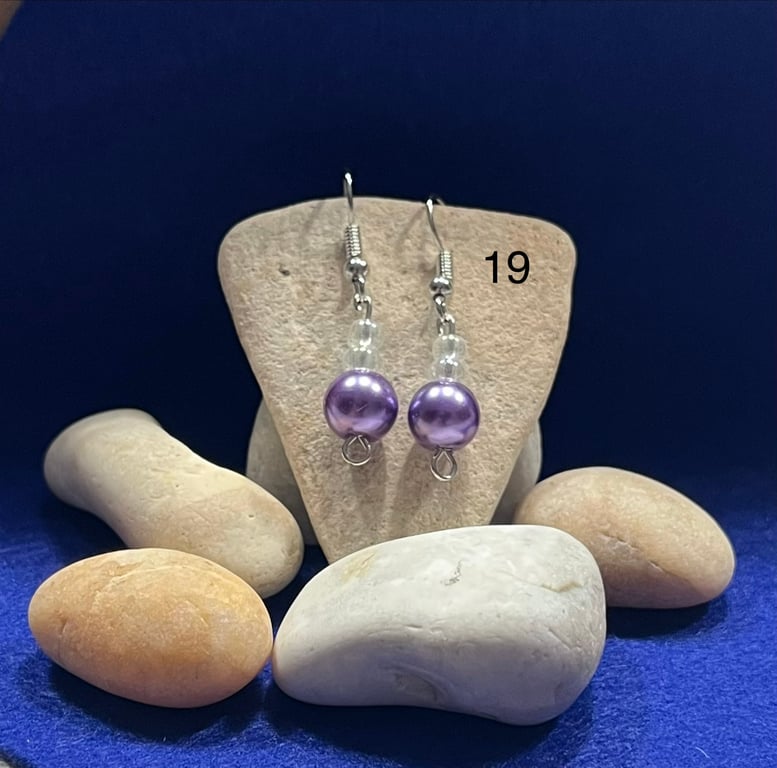 Beautiful purple dangling earrings.