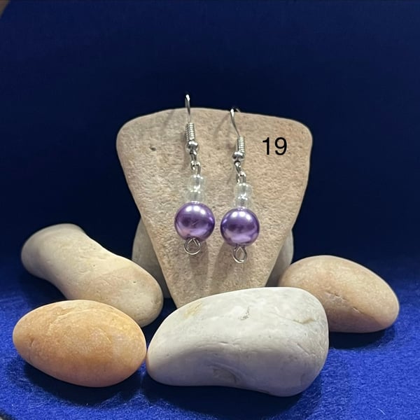 Beautiful purple dangling earrings.