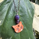 Ceramic handmade cat necklace with purple glass beads